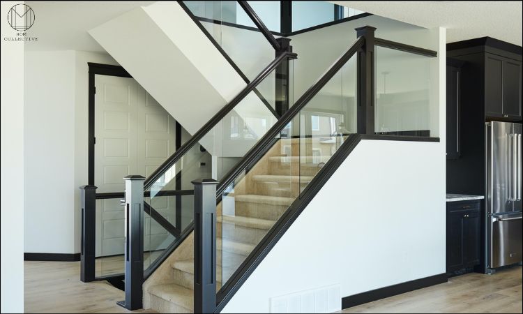 wrought iron railing with glass panels